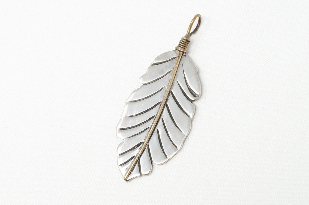 Native American Tobias Brass Feather Handmade Sterling Silver Necklace Pendant | Jewelry > Necklaces > Pendants | Wiccan Center