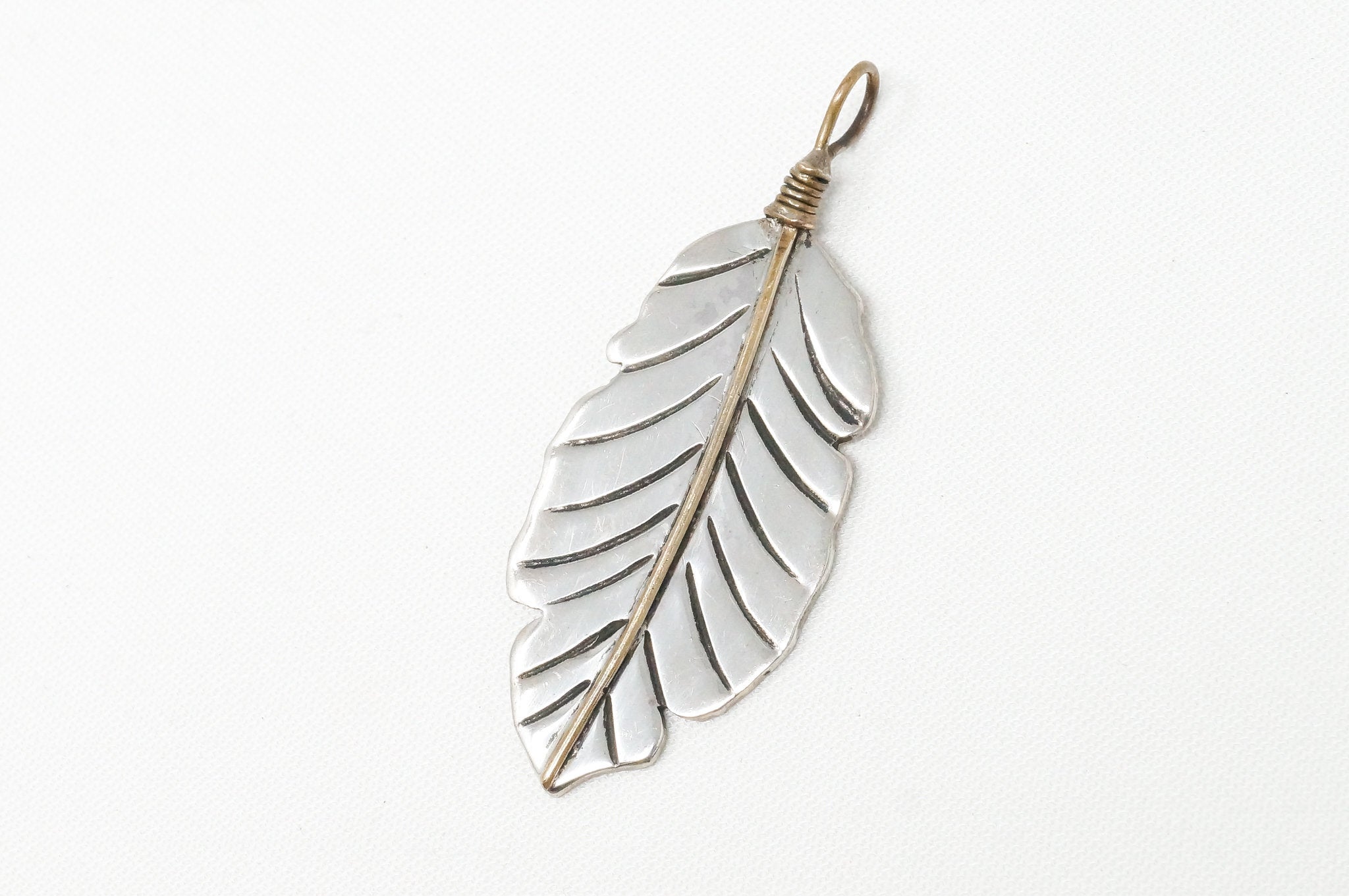 Native American Tobias Brass Feather Handmade Sterling Silver Necklace Pendant | Jewelry > Necklaces > Pendants | Wiccan Center