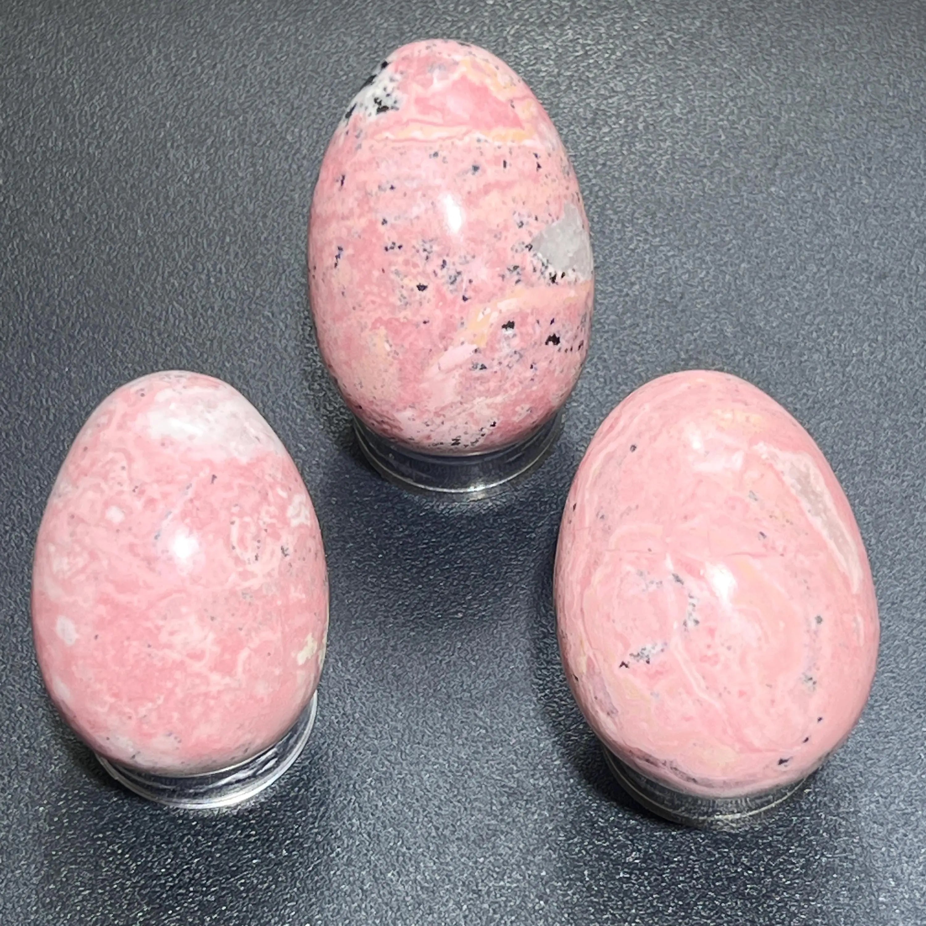 Pink Rhodonite Crystal Egg Carving Wholesale | Home & Living > Home Decor > Home Accents > Rocks & Geodes | Wiccan Center