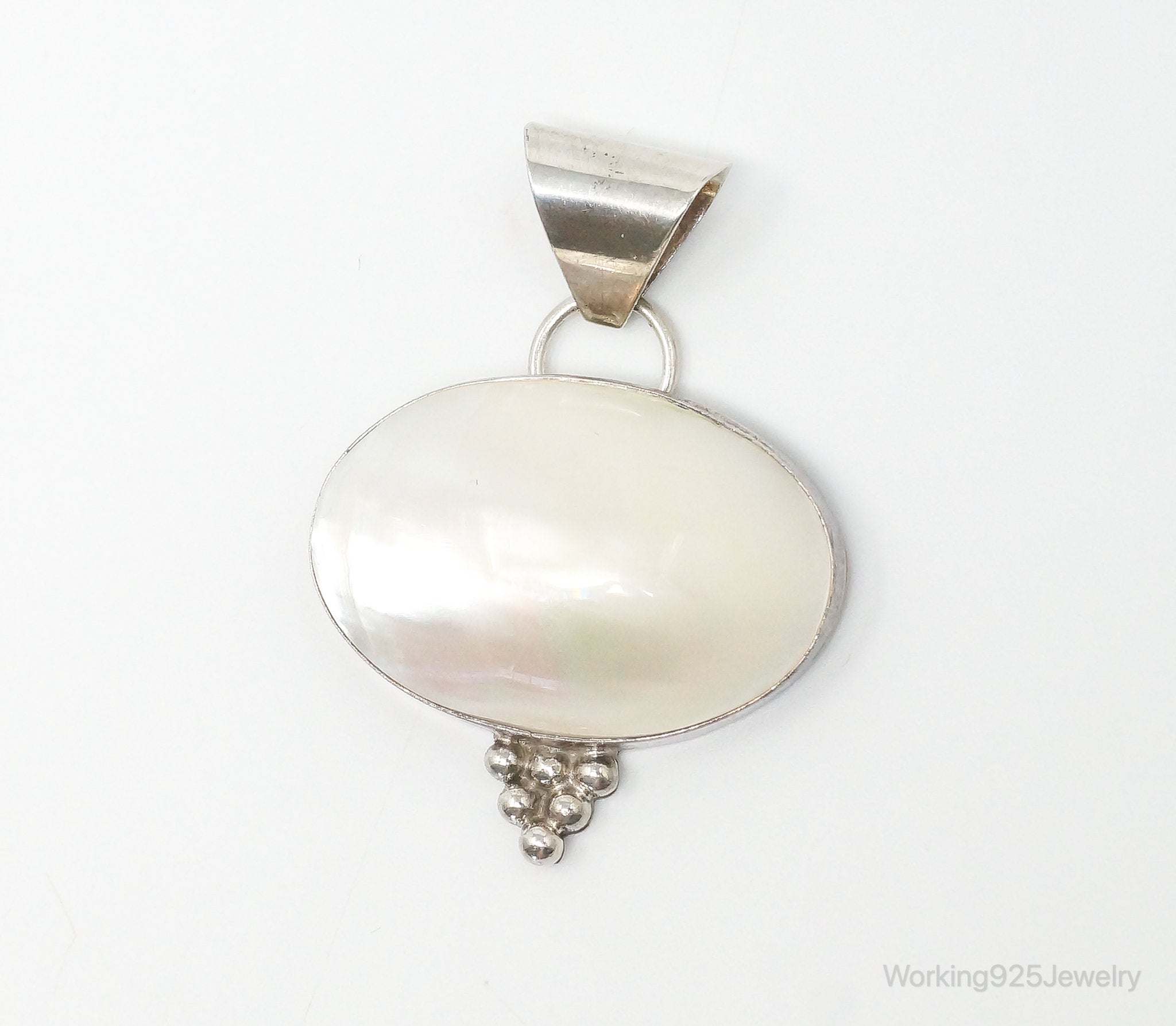 Large Native American Navajo Jason Livingston Pearl Sterling Silver Pendant | Jewelry > Necklaces > Pendants | Wiccan Center