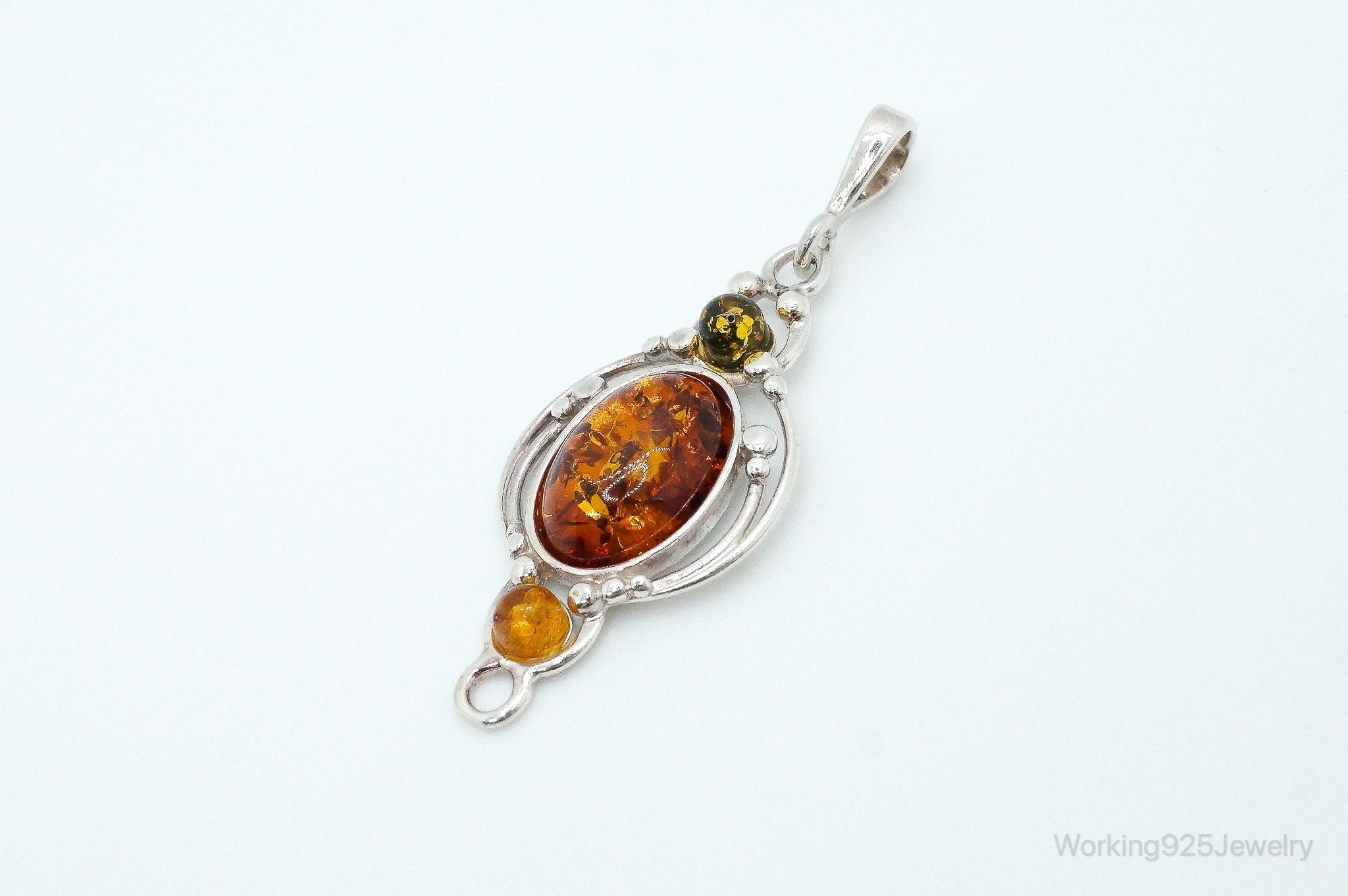 Vintage Multi Type Amber Sterling Silver Necklace Pendant | Jewelry > Necklaces > Pendants | Wiccan Center