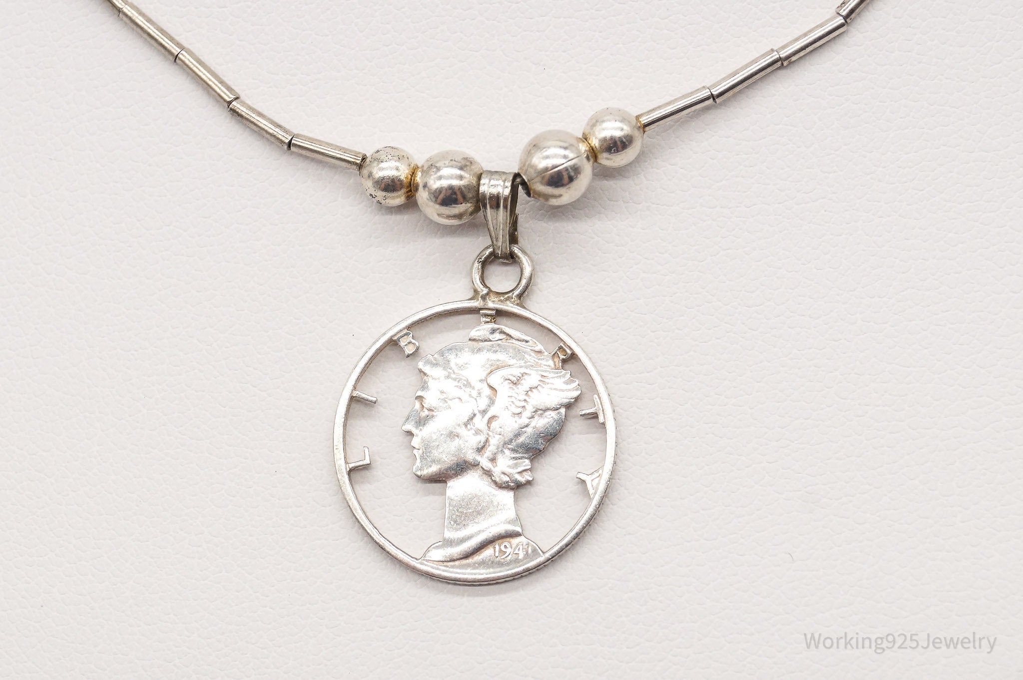 Vintage 1941 Mercury Dime Coin Cut Out Pendant Silver Necklace | Jewelry > Necklaces > Pendants | Wiccan Center