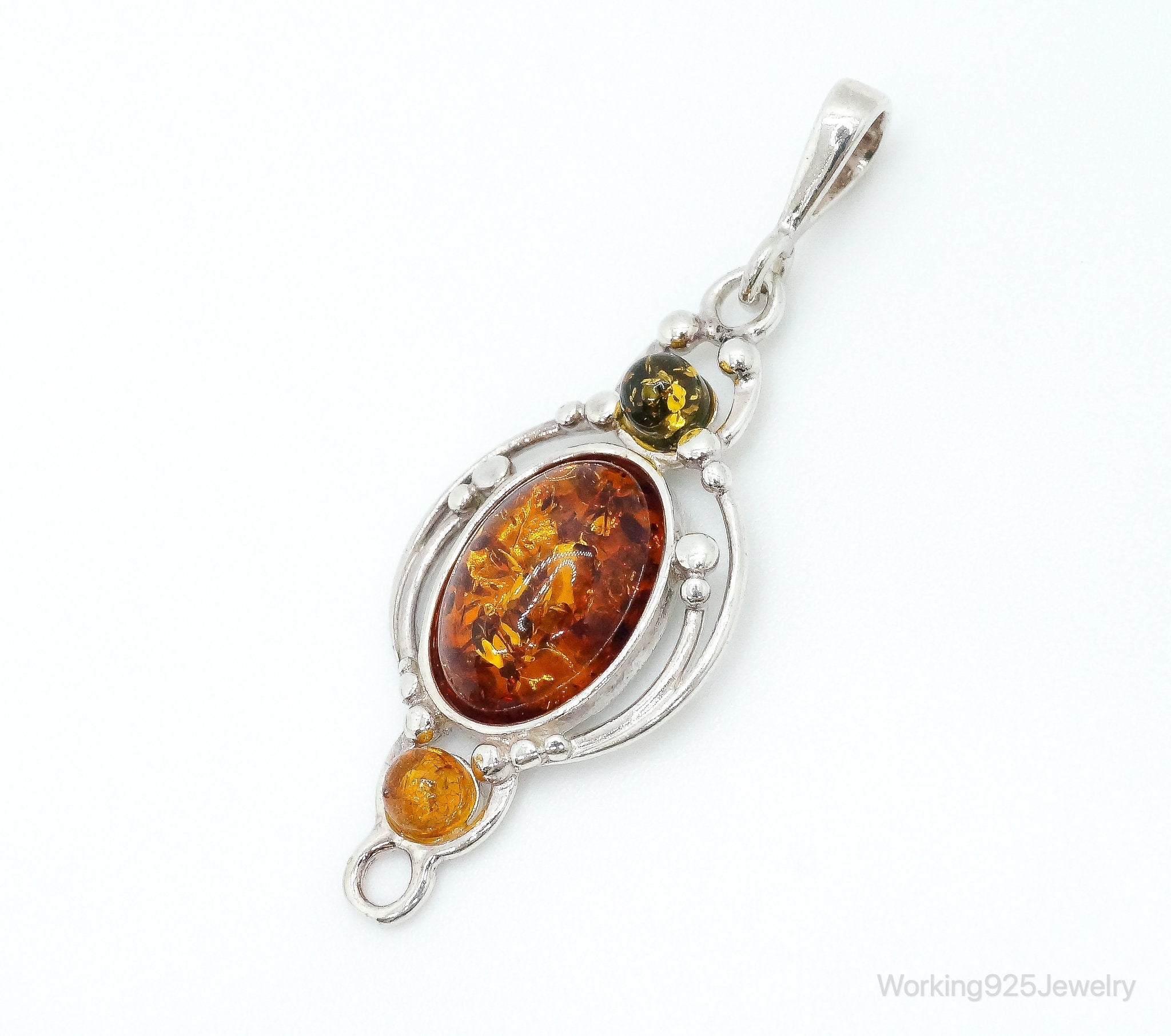 Vintage Multi Type Amber Sterling Silver Necklace Pendant | Jewelry > Necklaces > Pendants | Wiccan Center