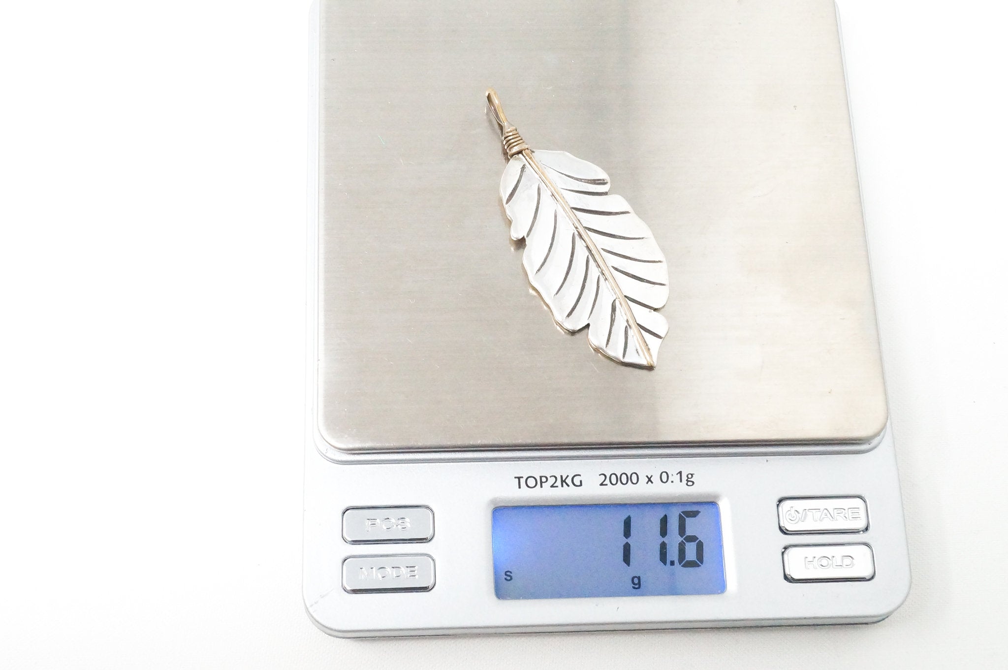 Native American Tobias Brass Feather Handmade Sterling Silver Necklace Pendant | Jewelry > Necklaces > Pendants | Wiccan Center