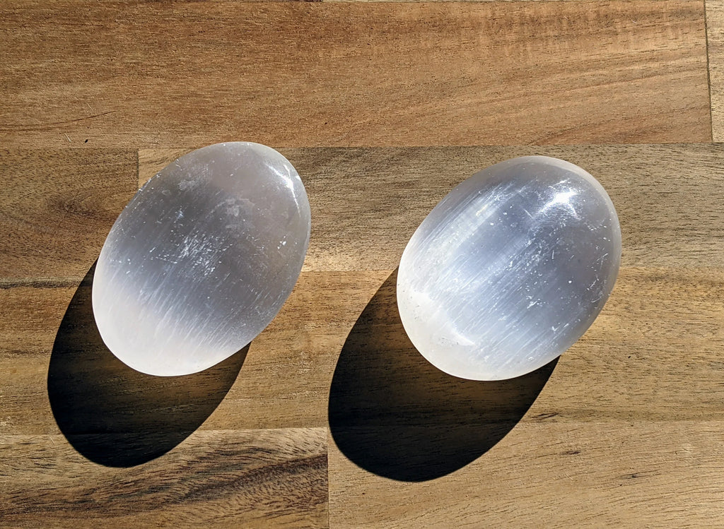 Selenite Palm Stones | | Wiccan Center