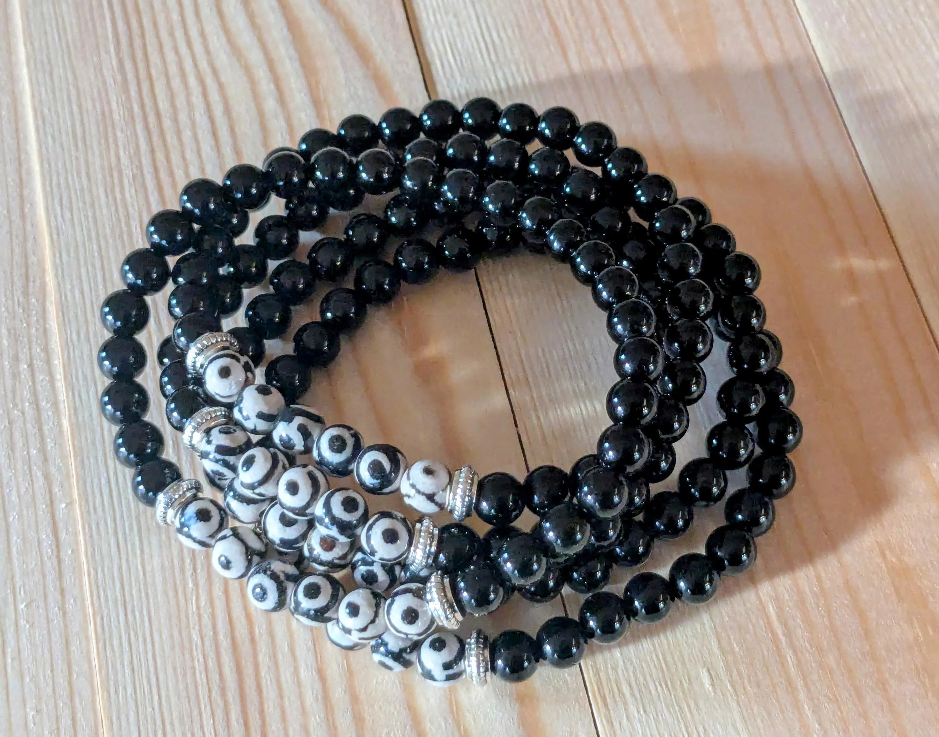 Tibetan Triple Eye Dzi & Black Onyx Stretch Bracelets | | Wiccan Center