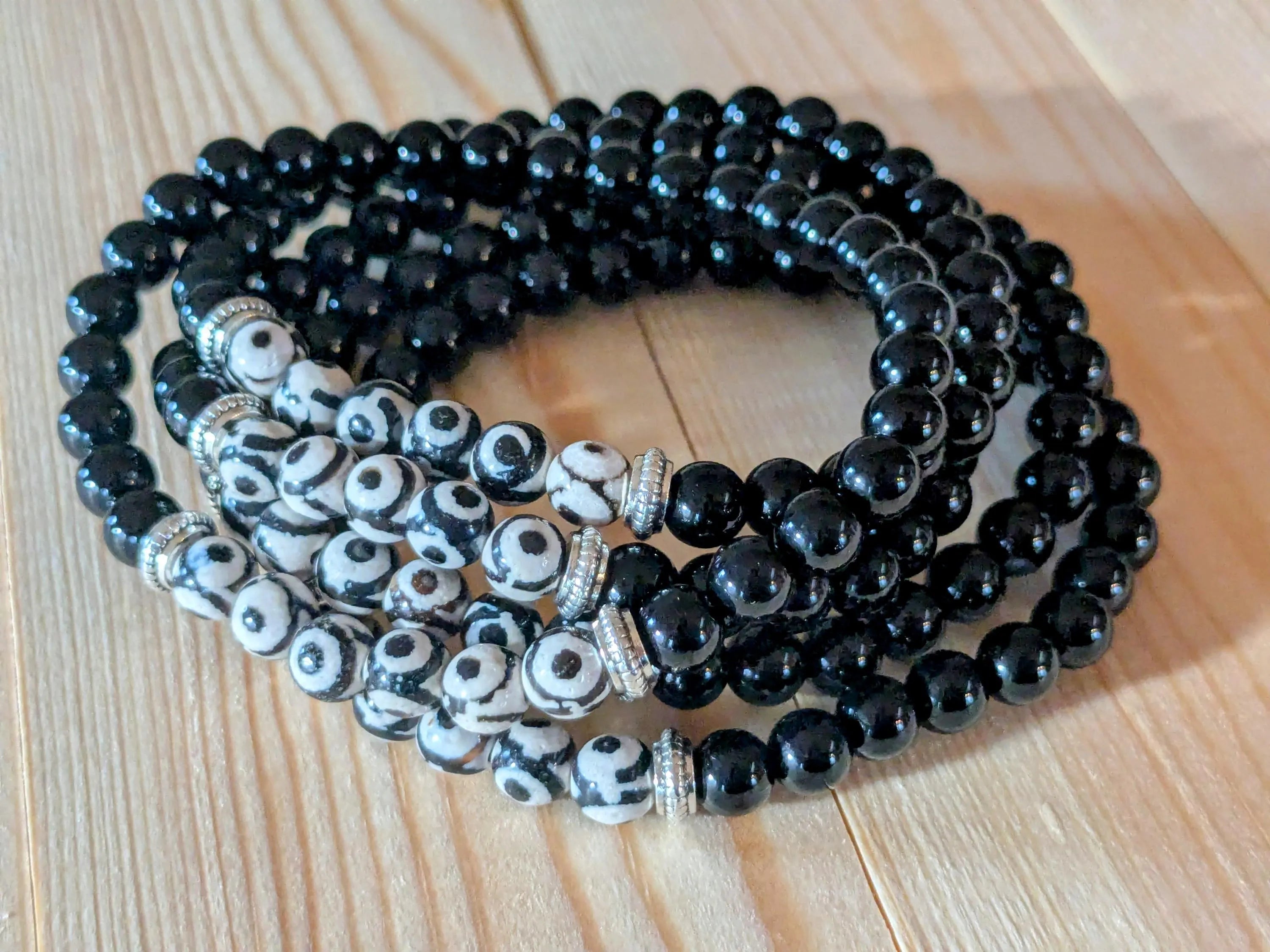 Tibetan Triple Eye Dzi & Black Onyx Stretch Bracelets | | Wiccan Center