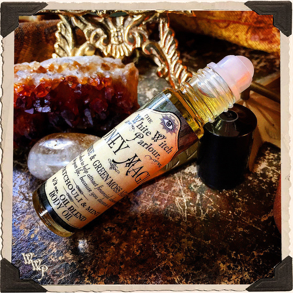 MONEY MAGICK Elixir 1/3oz. BODY OIL Rollon. Scent of Patchouli & Mint. Blessed by Citrine & Green Moss Agate Crystals. | aromatherapy, perfume, oils | Wiccan Center