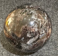 Garnet in Astrophyllite Sphere | Sphere | Wiccan Center
