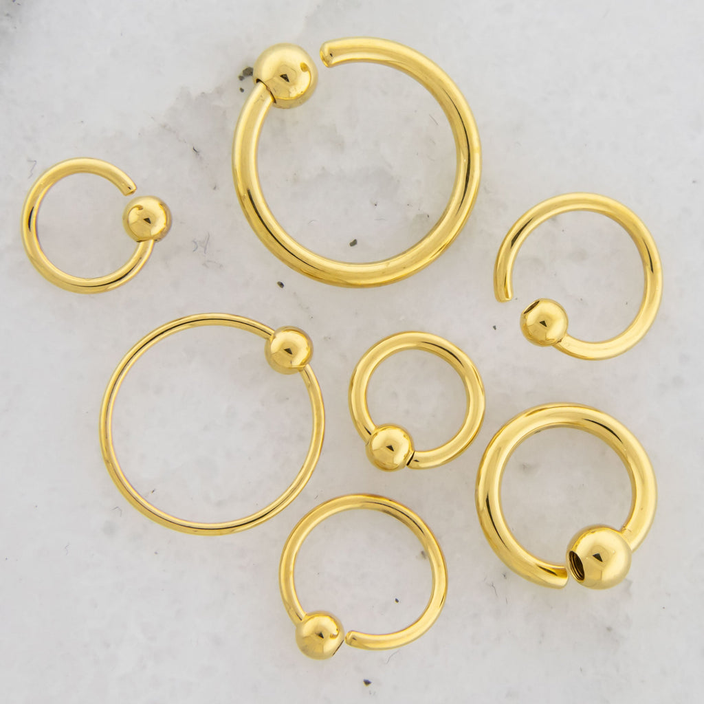 14G - 20G Gold Plated Steel Fixed Bead Captive Rings | Body Jewelry | Wiccan Center