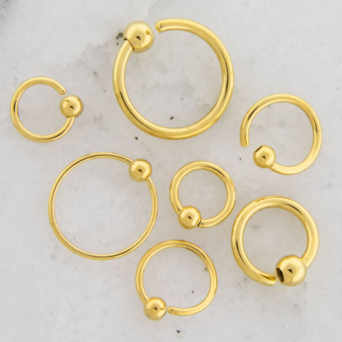 14G - 20G Gold Plated Steel Fixed Bead Captive Rings | Body Jewelry | Wiccan Center