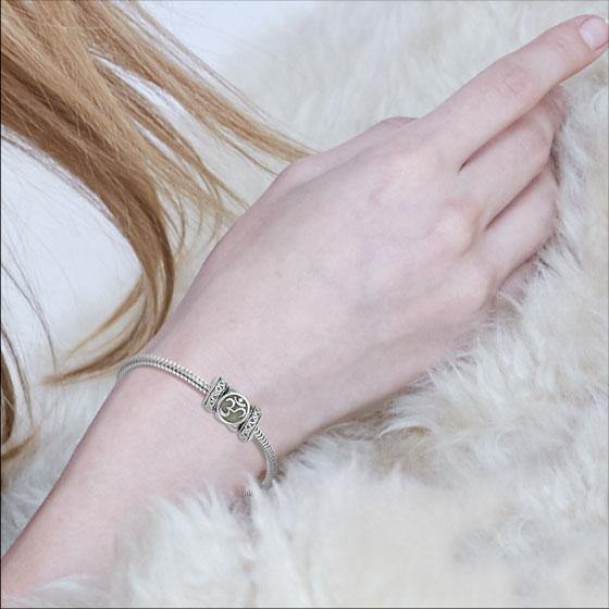 Om Symbol with Celtic Accented Silver Bead TBD364