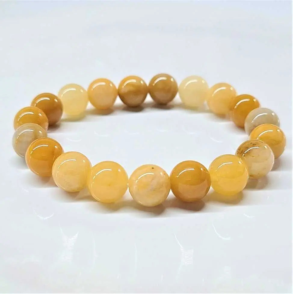 Yellow Jade Round Bead Bracelet - Courageous Joy | Bracelets | Wiccan Center